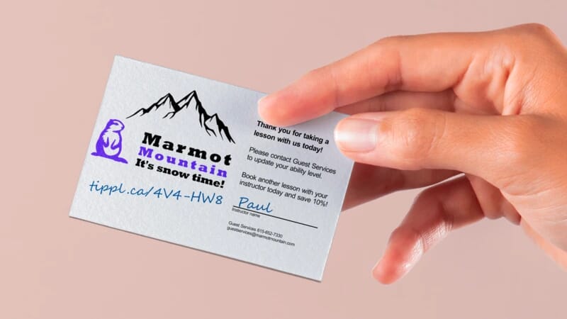 A voucher for a customer to book another ski lesson, the instructor has hand written their tippl code on the voucher